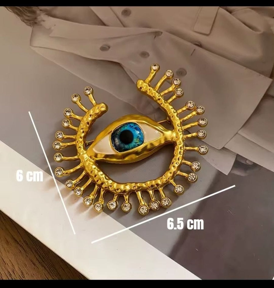 Blue eye strass gold brooch