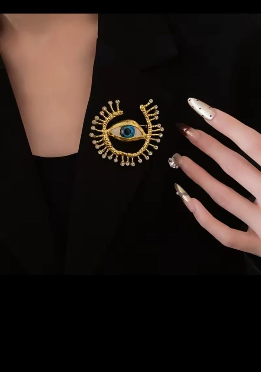 Blue eye strass gold brooch