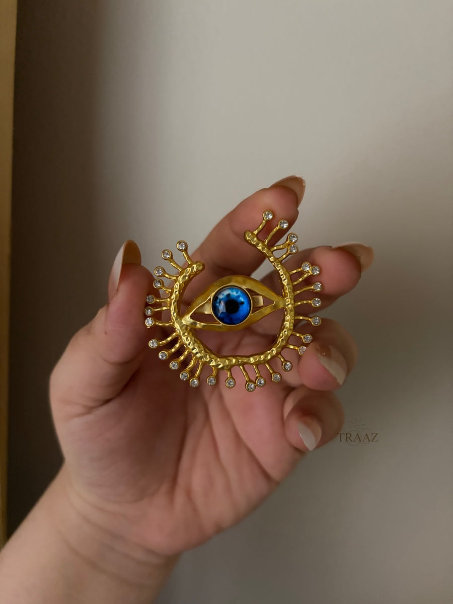 Blue eye strass gold brooch