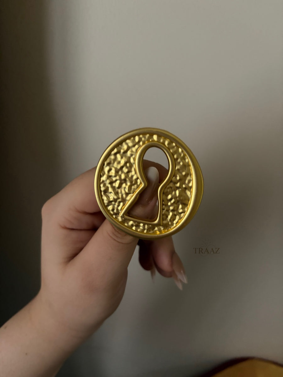   2 gold lock brooch