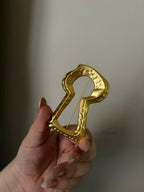   1 gold lock brooch