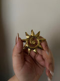 Sun brooch